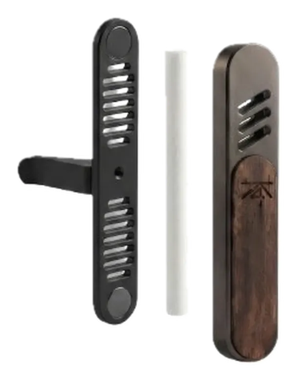 K4KAILASA vent-clip diffuser components: black clip mount, fragrance pad, and walnut faceplate